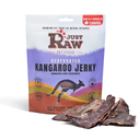 Dehydrated kangaroo jerky treat for pets, showing dried, sliced kangaroo meat from Just Raw Pet Food in a natural setting.